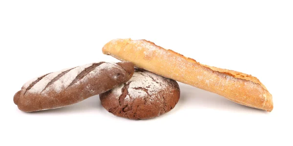 Two brown and one white breads. — Stock Photo, Image