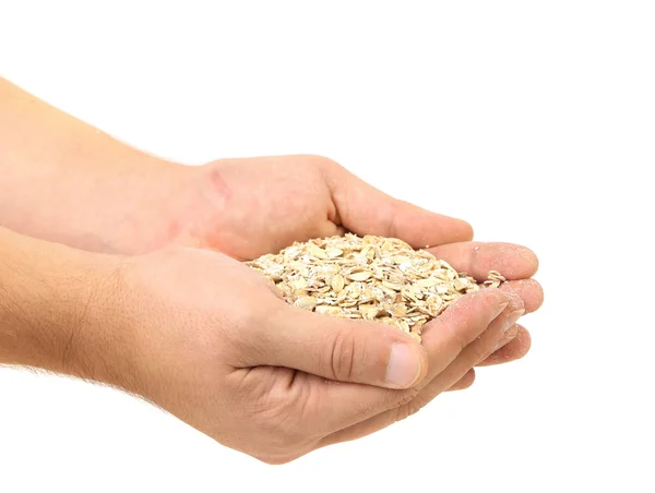 Un puñado de copos de avena . —  Fotos de Stock