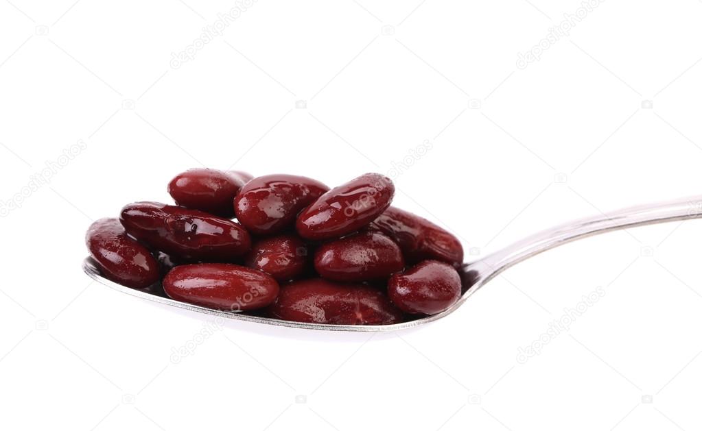 Preserve beans on a spoon.