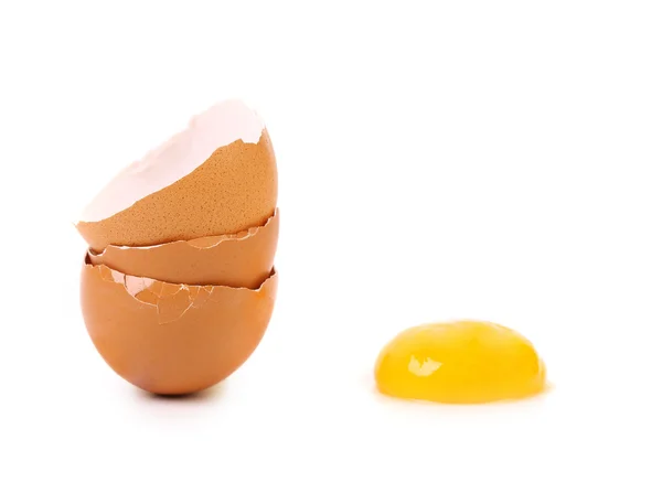 Two broken eggs and one yolk — Stock Photo, Image