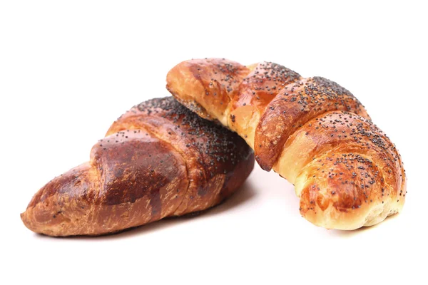 Appetizing croissants with poppy. — Stock Photo, Image