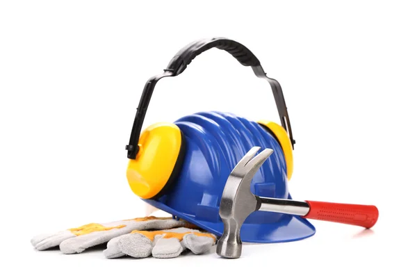 Hard hat and ear muffs hammer. — Stock Photo, Image