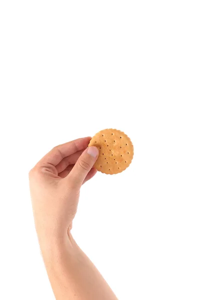 Hand holds cookie biscuits with filling — Stock Photo, Image