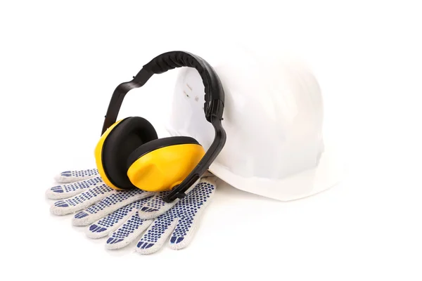 Protective ear muffs and gloves — Stock Photo, Image