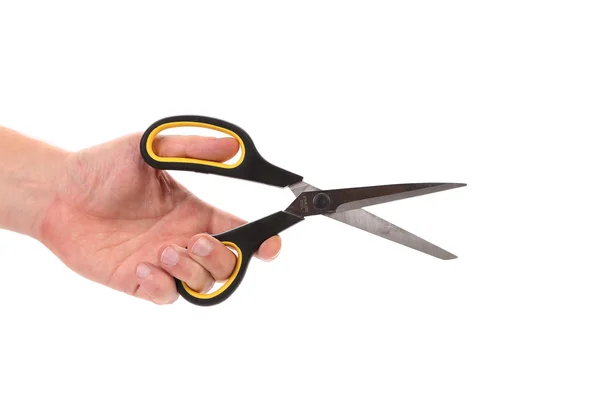 Mannenhand bedrijf schaar. — Stockfoto