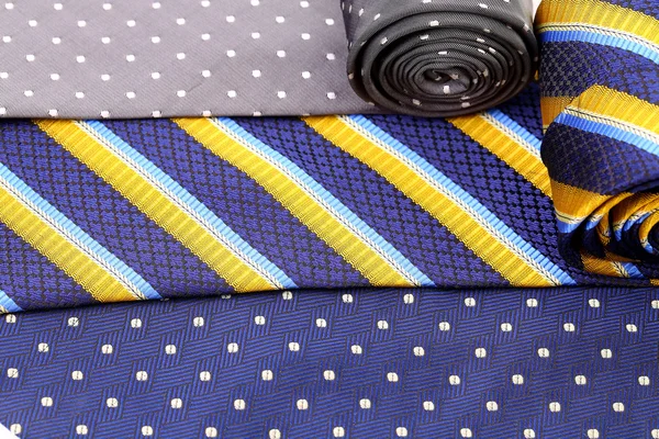 Background of three multi-colored tie. — Stock Photo, Image