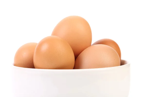 Bowl with brown eggs. Fragment. — Stock Photo, Image