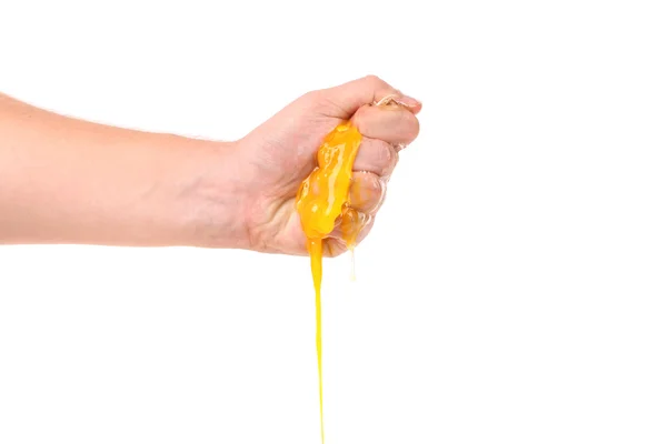 Hand pressing of egg. — Stock Photo, Image
