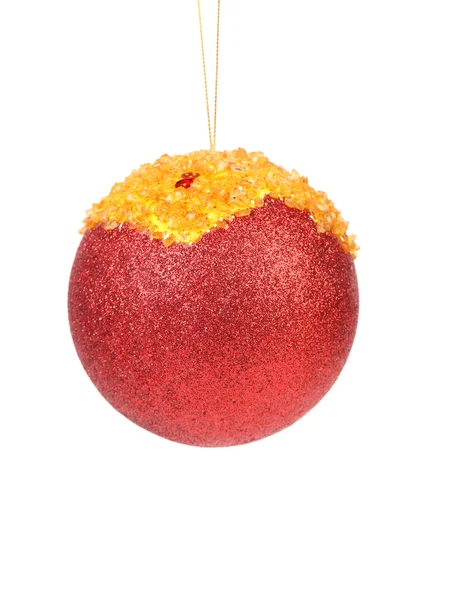 Natale rosso palla coperto ambra briciole . — Foto Stock