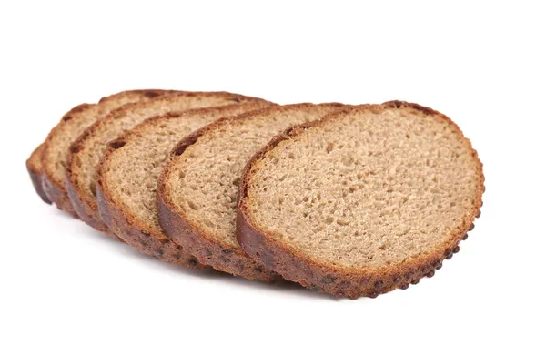Segmenten van bruin brood. — Stockfoto