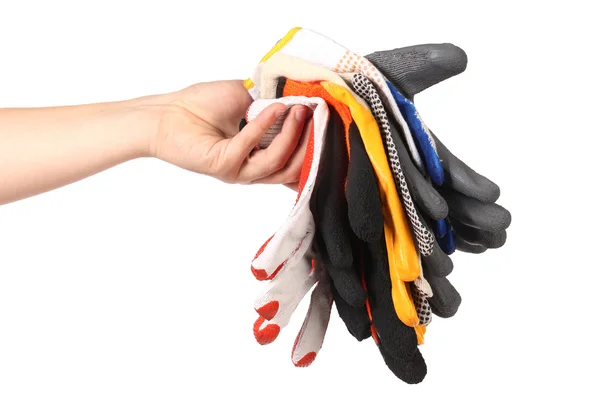 Hand holds protective different gloves — Stock Photo, Image