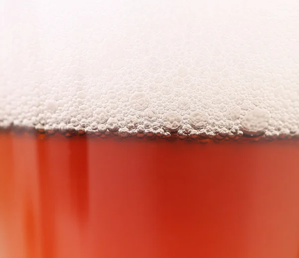 Close up of beer with foam. — Stock Photo, Image