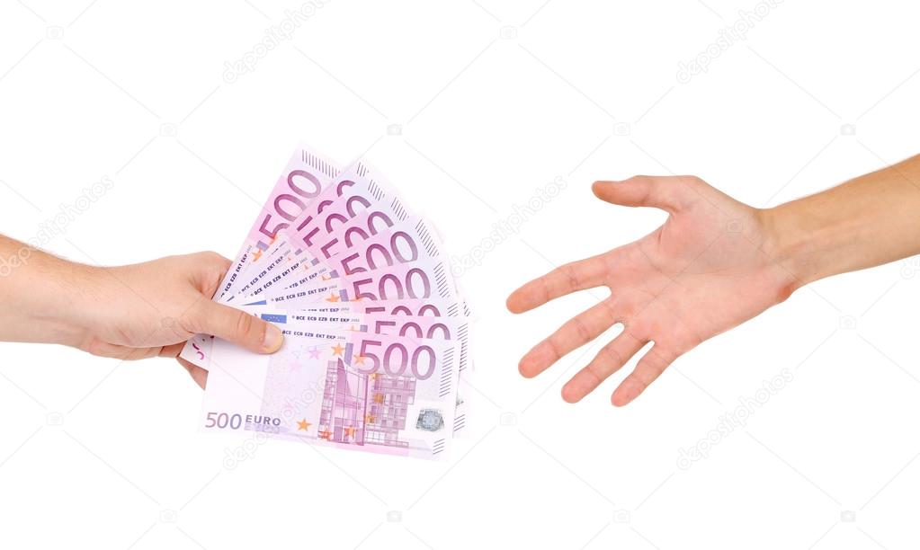 Male hand giving money to a man.