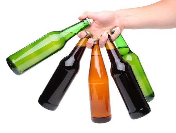 Cinco botellas de cerveza y mano —  Fotos de Stock