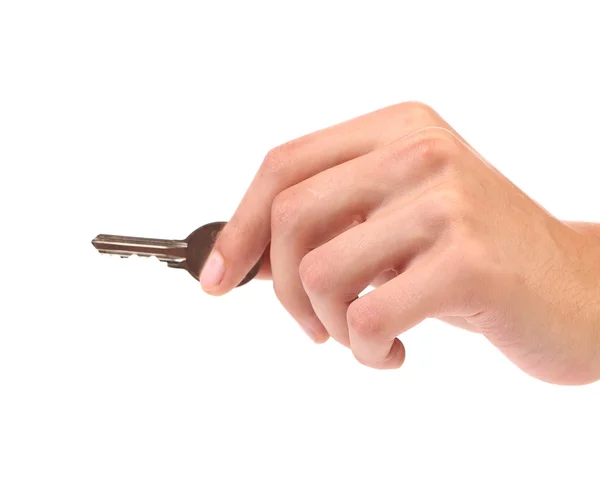 Hand houdt een kleine sleutel — Stockfoto
