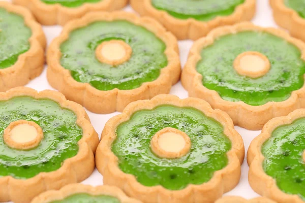 Background of biscuit with kiwi jam. — Stock Photo, Image