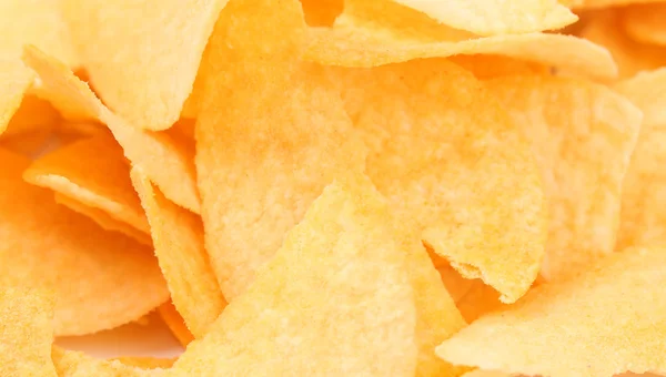 Achtergrond van chips. — Stockfoto