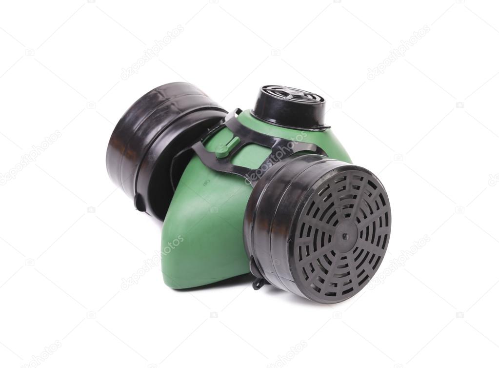 Side view of green gas mask.