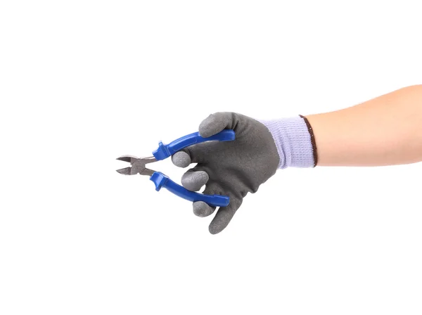 Hand in handschoenen houden tangen. — Stockfoto
