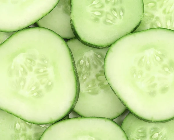 Background of sliced fresh cucumbers. — Stock Photo, Image