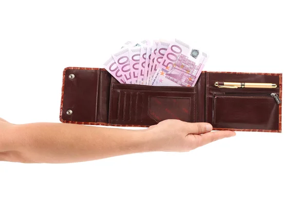Porte-monnaie ouvert avec billets en euros à portée de main . — Photo