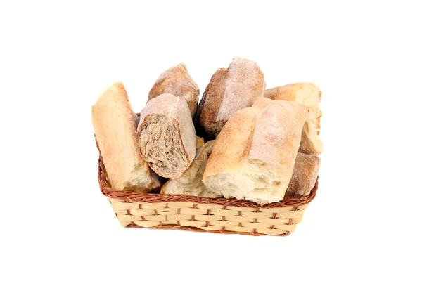 Torned bread in basket. — Stock Photo, Image