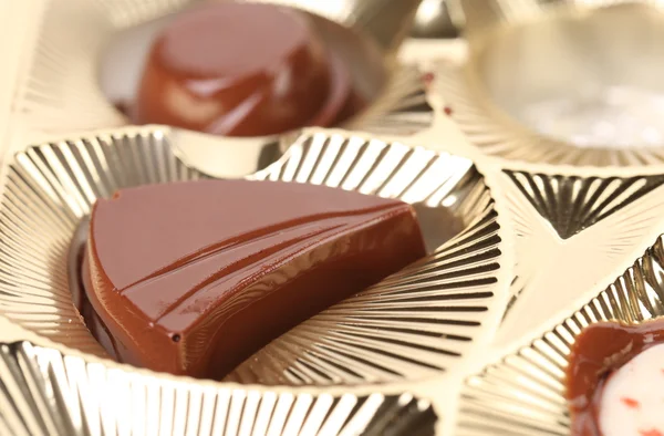 Achtergrond van doos met chocolade — Stockfoto