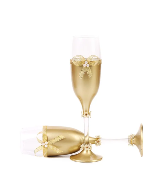 Decorated wedding golden glasses — Stock Photo, Image