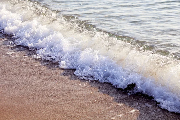 Sand og bølge – stockfoto