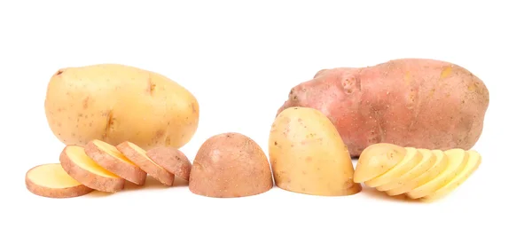 Different potatoes and split tuber. — Stock Photo, Image