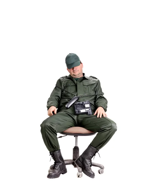 Homem de vestuário de trabalho sentado com telefone . — Fotografia de Stock