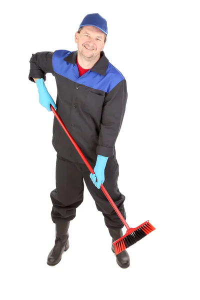 Man with cleaning broom. — Stock Photo, Image