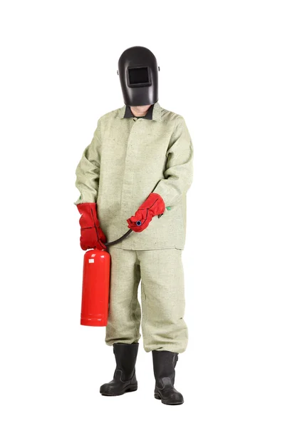 Welder in mask with fire extinguisher. — Stock Photo, Image