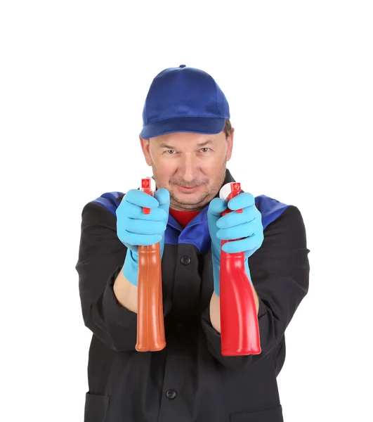 Man holds spray botlles as gun. — Stock Photo, Image