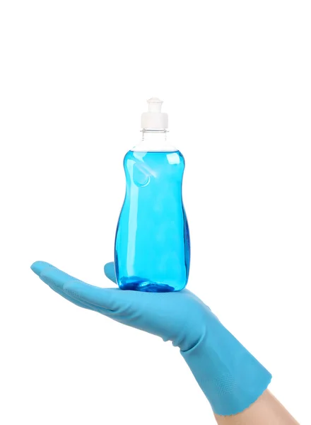 Hand in glove holding blue plastic bottle — Stock Photo, Image