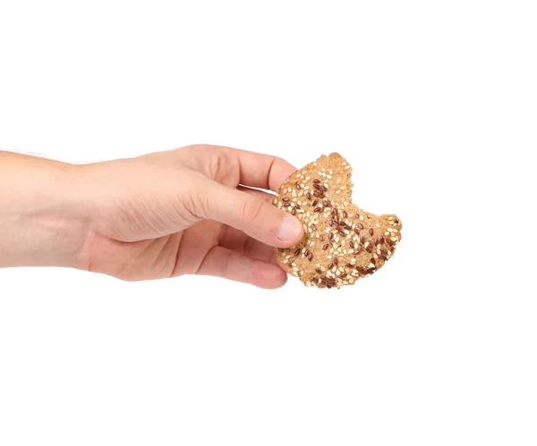 Tenue de main biscuit mordu . — Photo