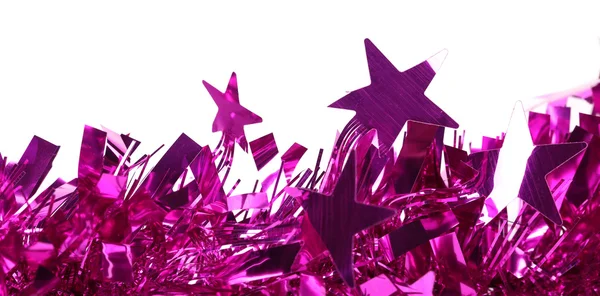 Close-up van Kerstmis paarse klatergoud met sterren. — Stockfoto