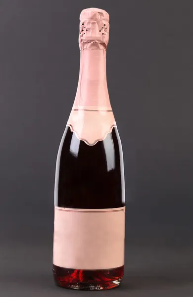 Pembe champange şişe. — Stok fotoğraf