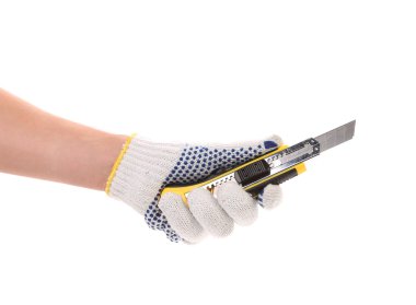 Sarı Kırtasiye bıçak elini tutar.