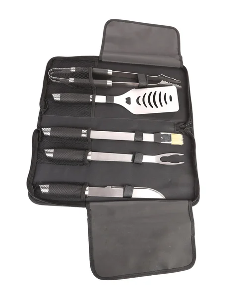 Set van hulpmiddelen voor bbq in zwarte tas. — Stockfoto