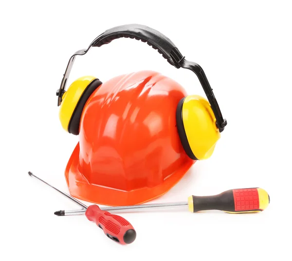 Hard hat ear muffs and screwdrivers. — Stock Photo, Image