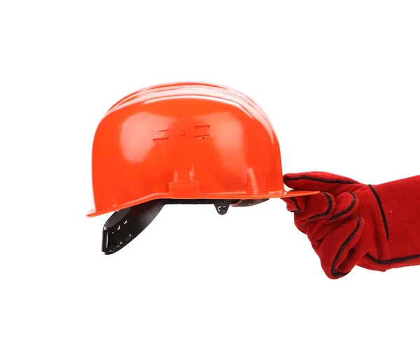 Hand in lederen handschoenen houdt hard hat. — Stockfoto