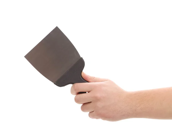 Hand holds construction spatula. — Stock Photo, Image