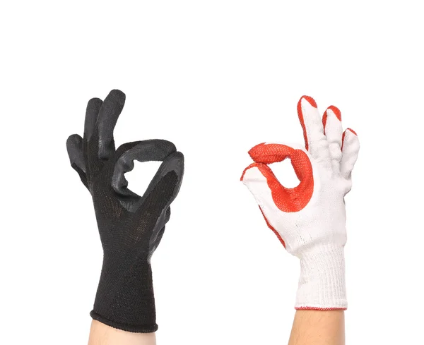 Werkende handen in handschoenen — Stockfoto