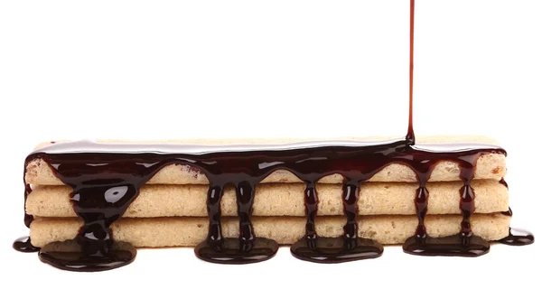 Chocolate stream on stics of biscuit. — Stock Photo, Image