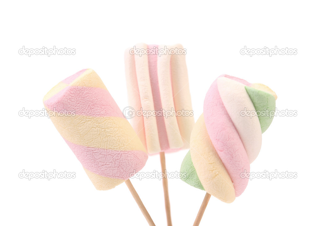 Three different colorful marshmallow on sticks