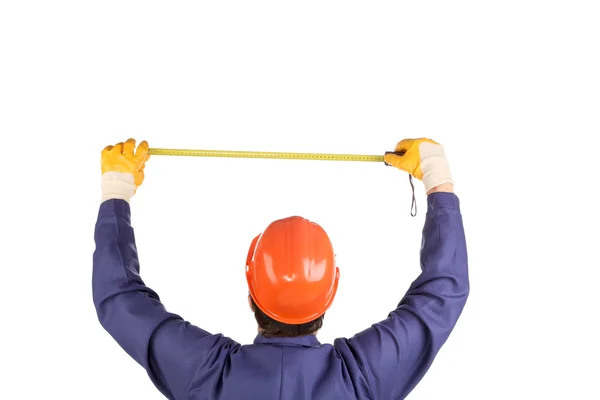 Trabajador en medida de sombrero duro con regla —  Fotos de Stock