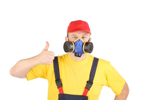 Pracownik w masce gazowej pokazuje kciuk — Zdjęcie stockowe