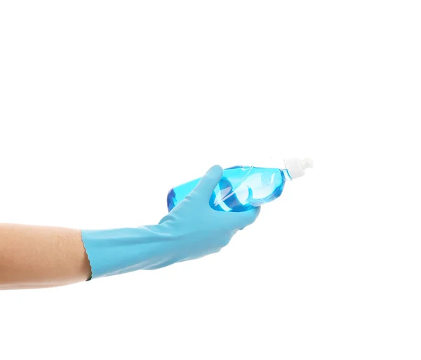 Hand in glove holding blue bottle — Stock Photo, Image