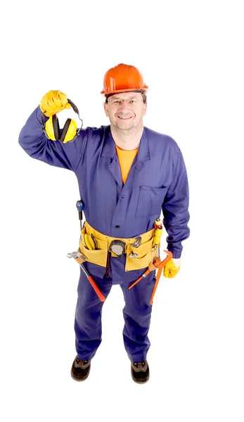 Worker in hard hat holding ear muffs — Stock Photo, Image